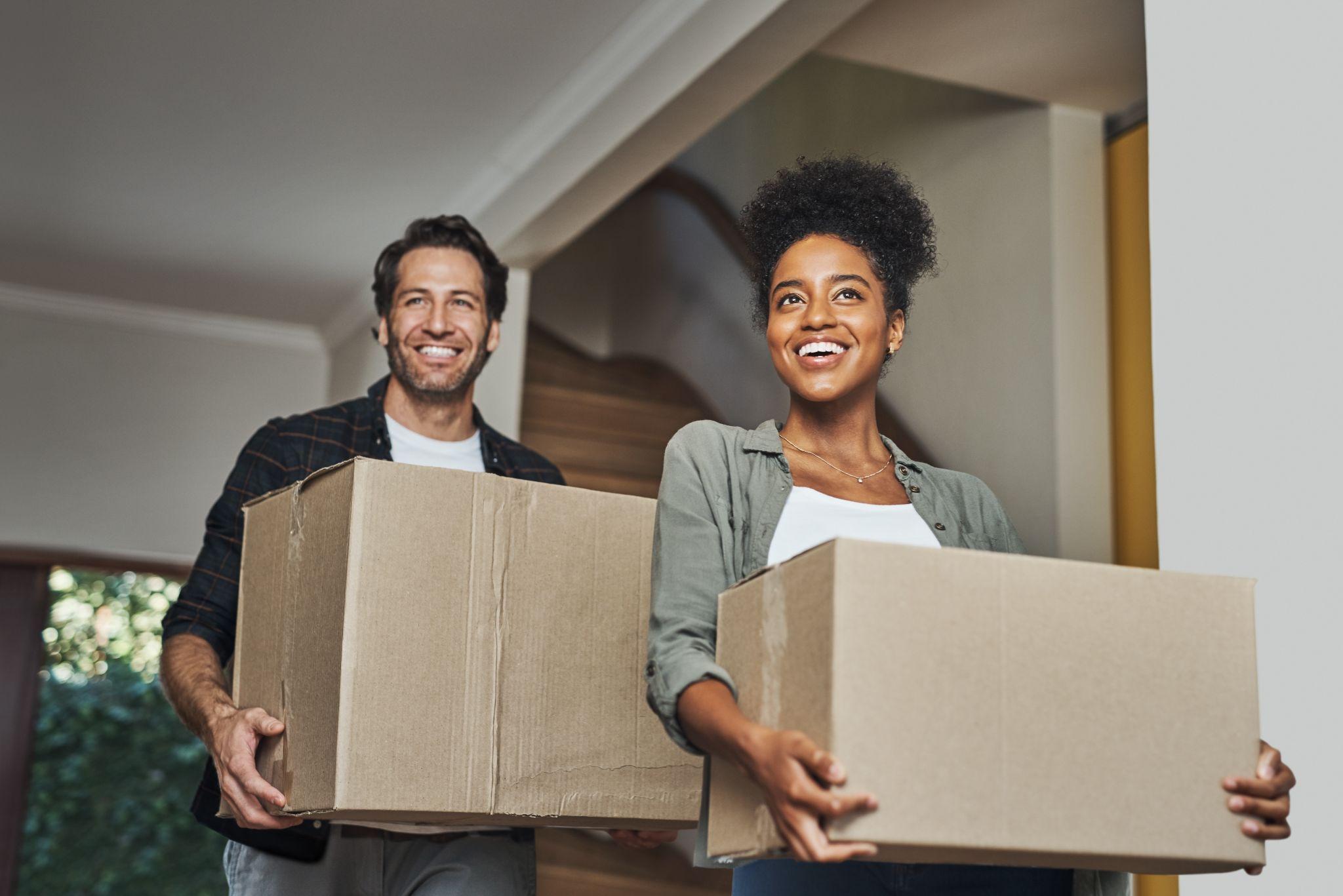 Couple moving into their first home