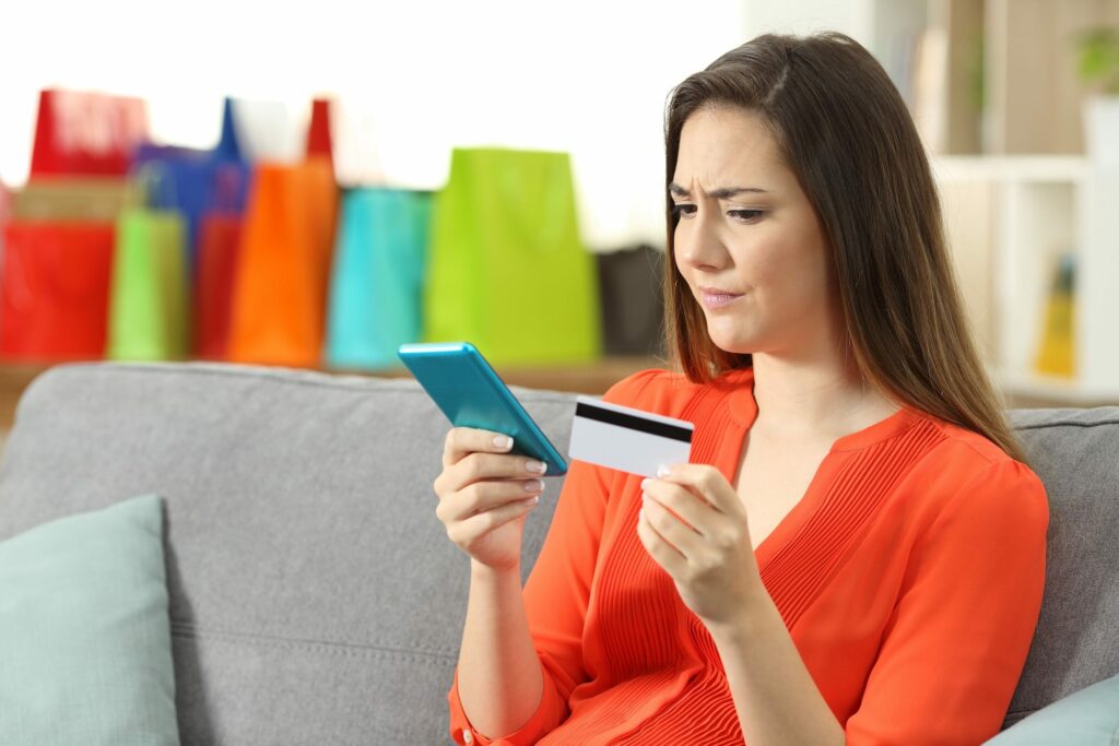 woman paying online with a credit card