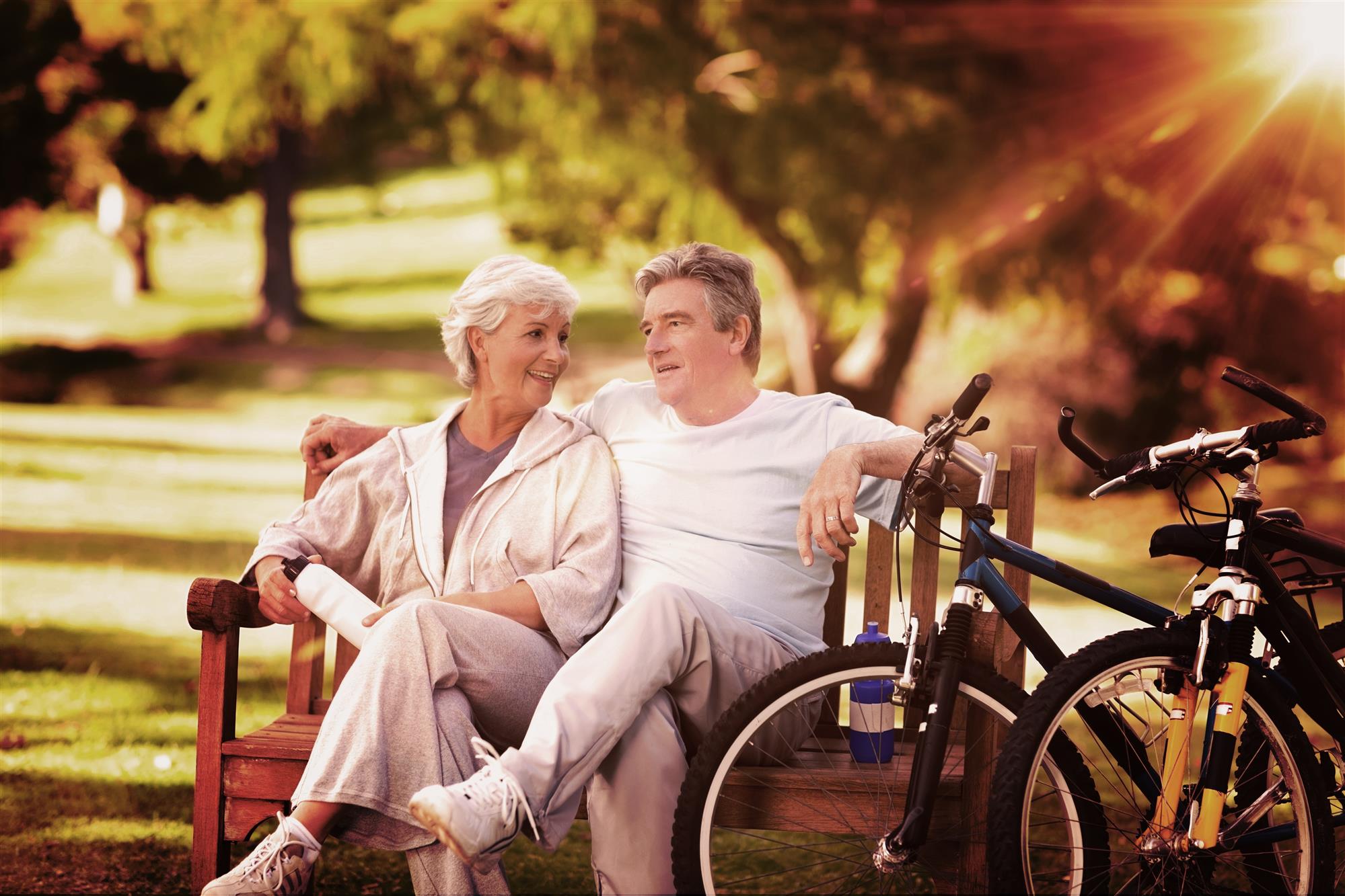 Elderly Couple With Their Bikes