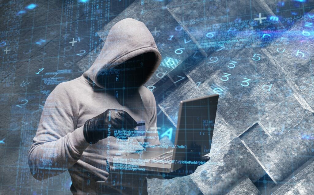 Hacker using laptop to steal identity against virus background