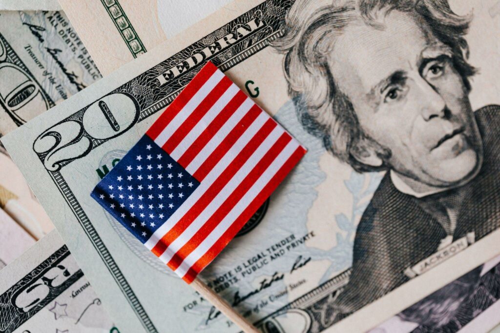 USA dollars and national flag