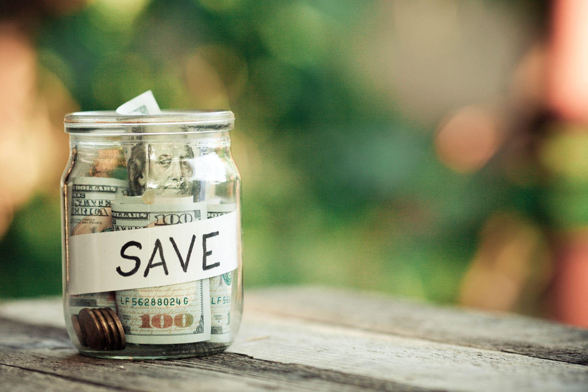 A savings jar with money inside