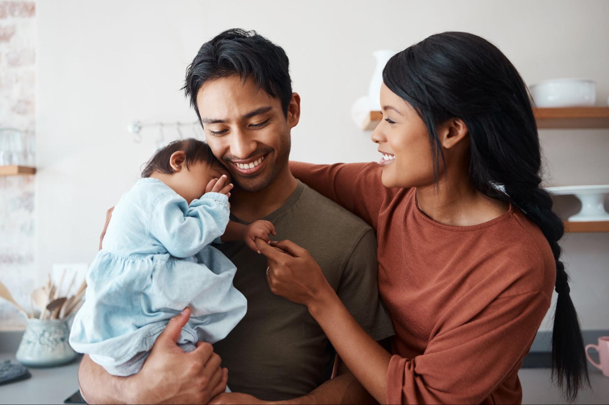 Parents with their new baby